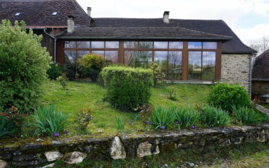 Superb stone property nestled in the heart of a 12 hectares estate decorated with natural springs and ponds.
