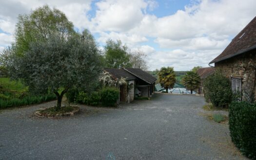 Superb stone property nestled in the heart of a 12 hectares estate decorated with natural springs and ponds.